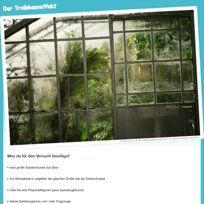 Man sieht ein Foto von einem Gewächshaus.